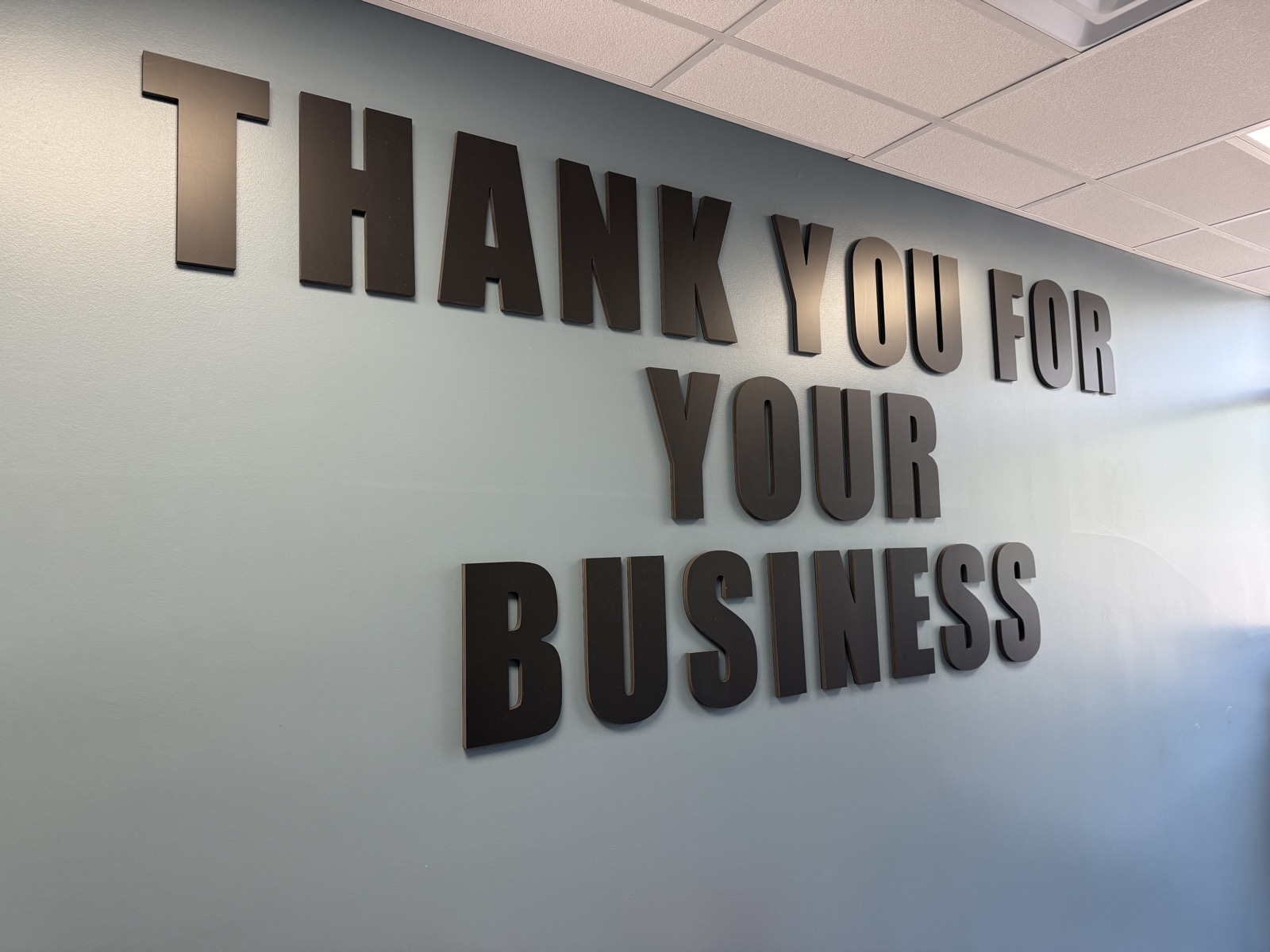 Thank you for your business wall sign inside Arlene's remodeled entrance