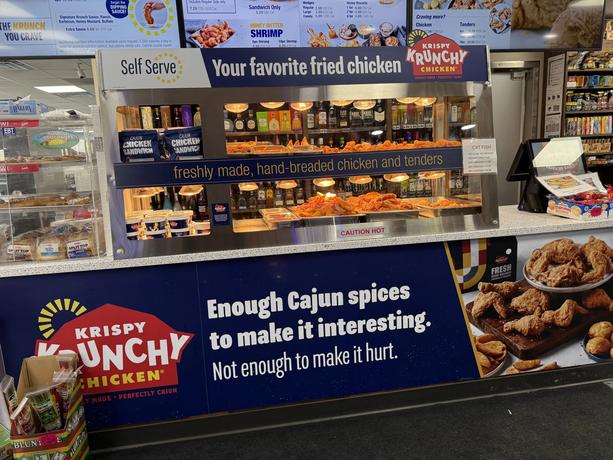 Arlene’s chicken display with fresh hand-breaded chicken and Cajun-style branding